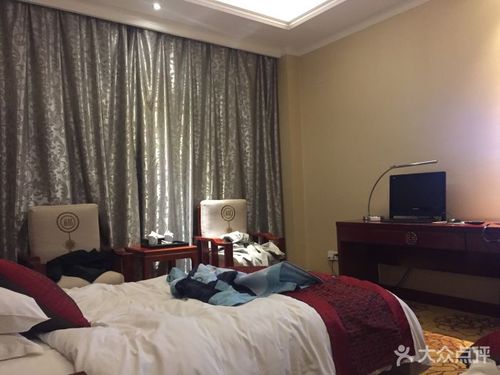 神木龙华府酒店电话